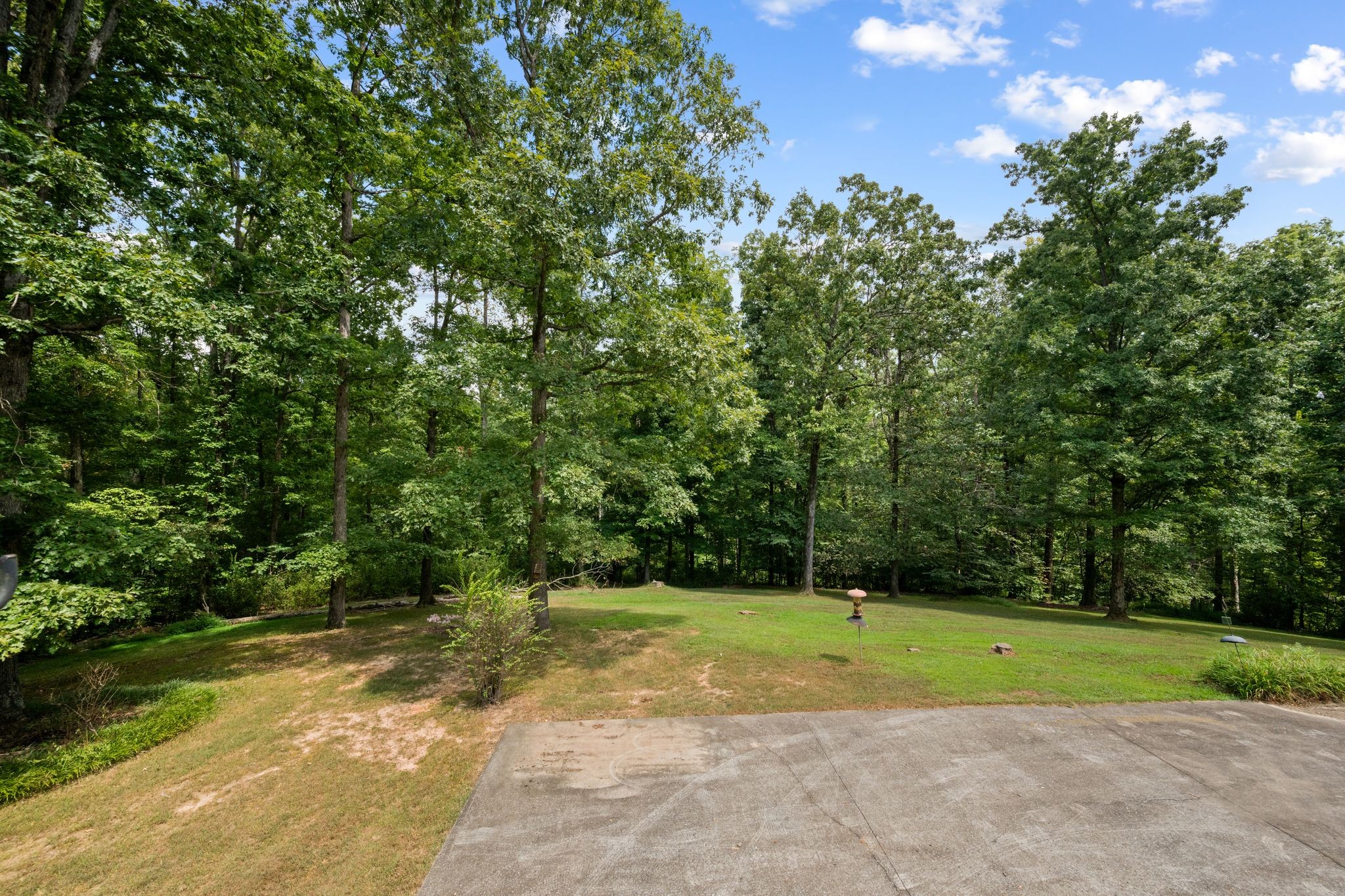 570 Gregson Place Waverly, TN 37185 - Photo 62 of 77 a view of a house with a yard