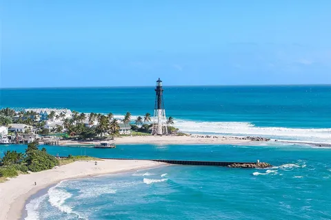 a view of a swimming pool and an ocean view