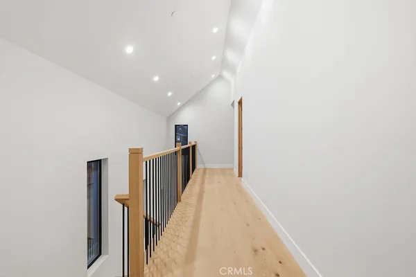 a view of a bathroom from the hallway