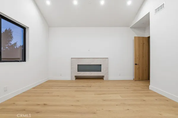 a view of an empty walk in closet