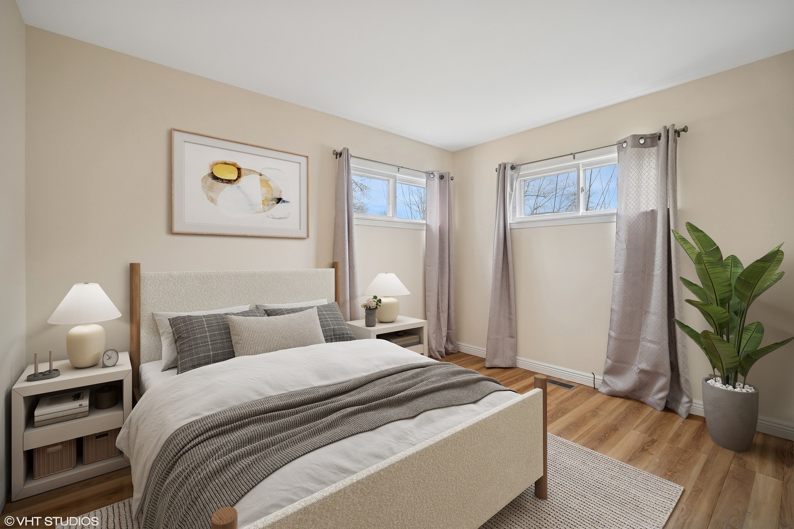 185 Carthage Lane Hoffman Estates, IL 60169 - Photo 11 of 18 a bedroom with bed and a potted plant