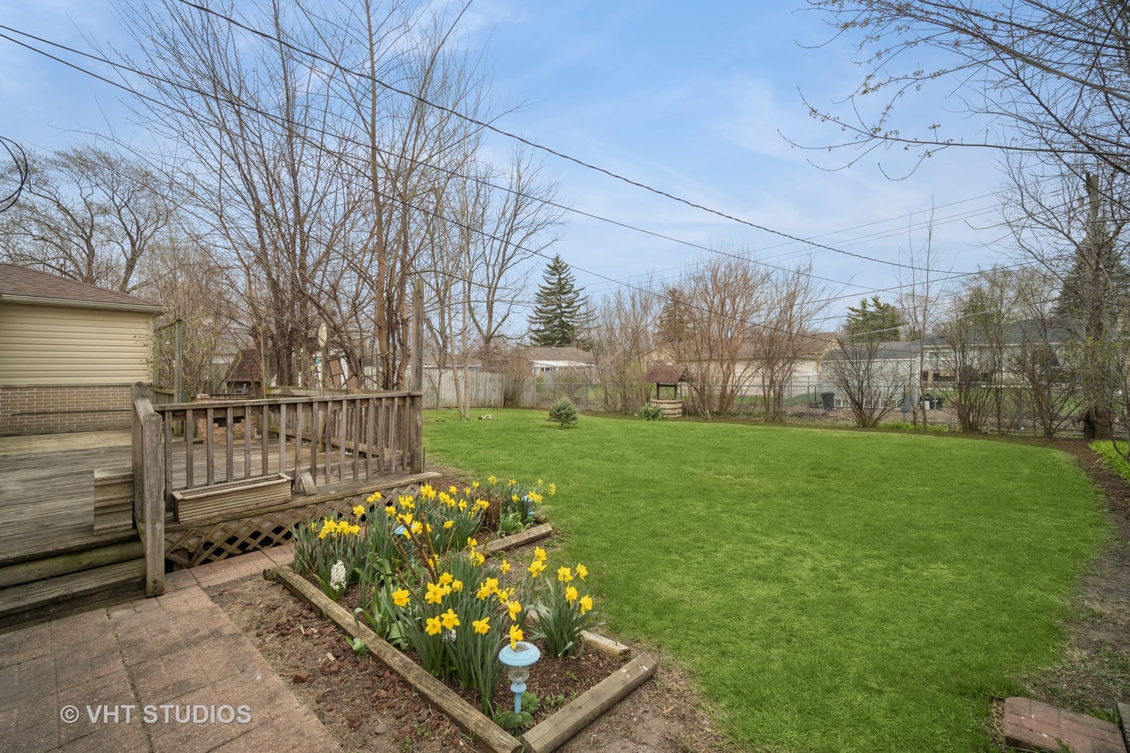 185 Carthage Lane Hoffman Estates, IL 60169 - Photo 15 of 18 a view of a pathway of house with wooden fence