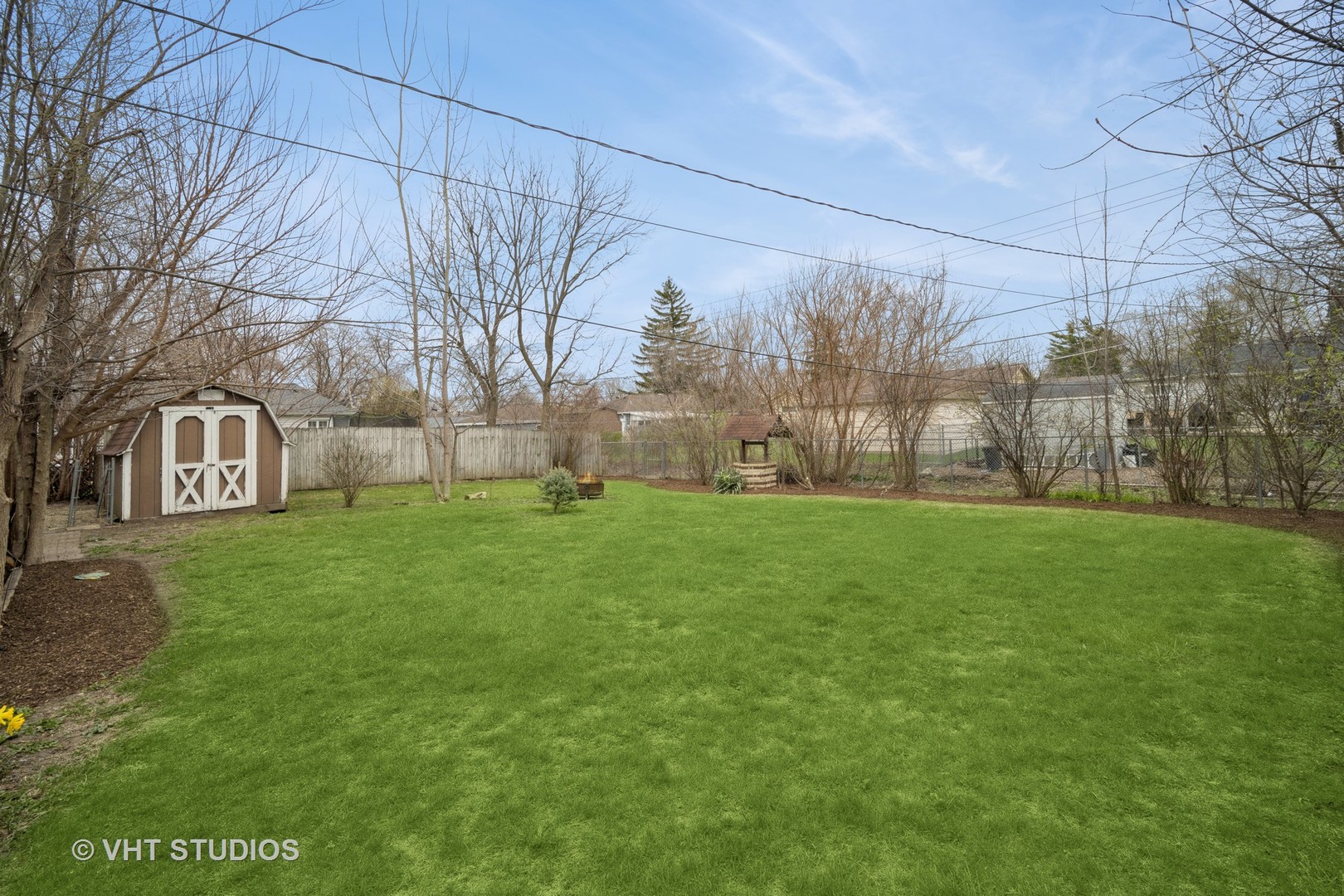 185 Carthage Lane Hoffman Estates, IL 60169 - Photo 16 of 18 a view of a house with a yard