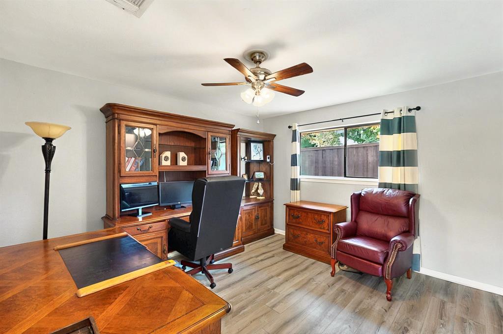 7109 Alpha Road Dallas, TX 75240 - Photo 20 of 36 a work room with furniture rug and a window