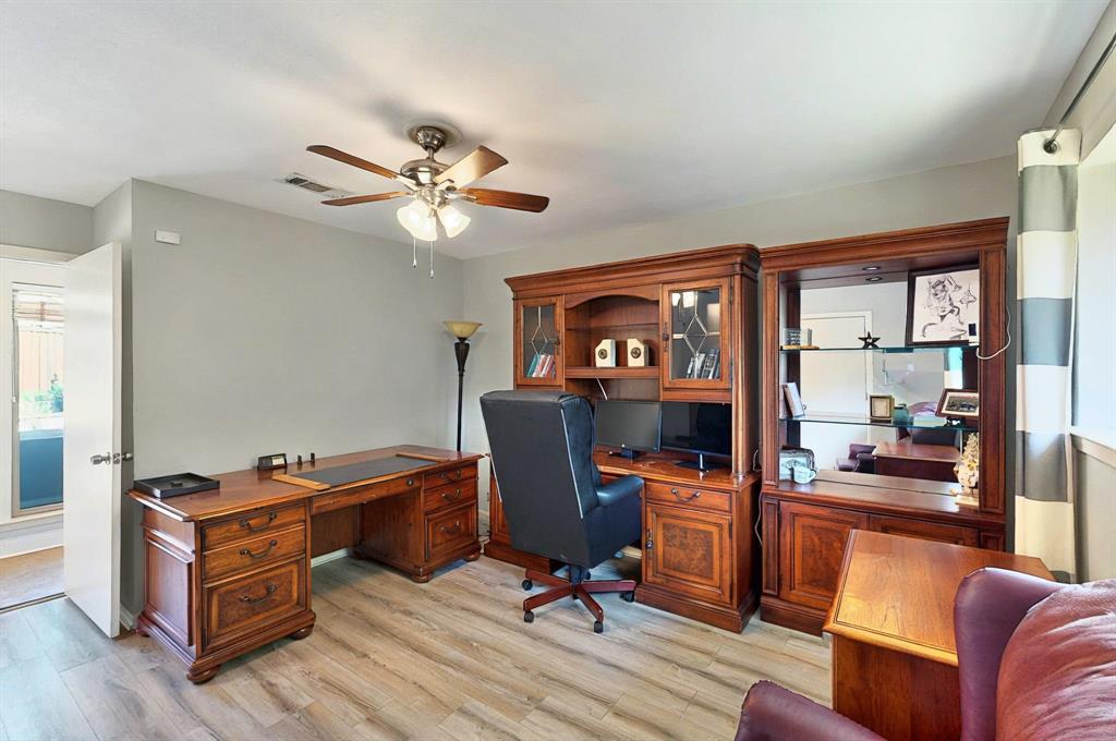 7109 Alpha Road Dallas, TX 75240 - Photo 21 of 36 a view of a workspace with furniture and a workspace