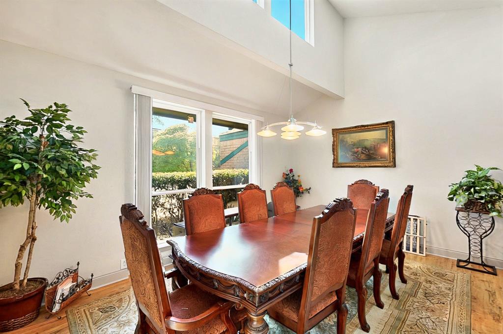 7109 Alpha Road Dallas, TX 75240 - Photo 7 of 36 a dining room with furniture and window