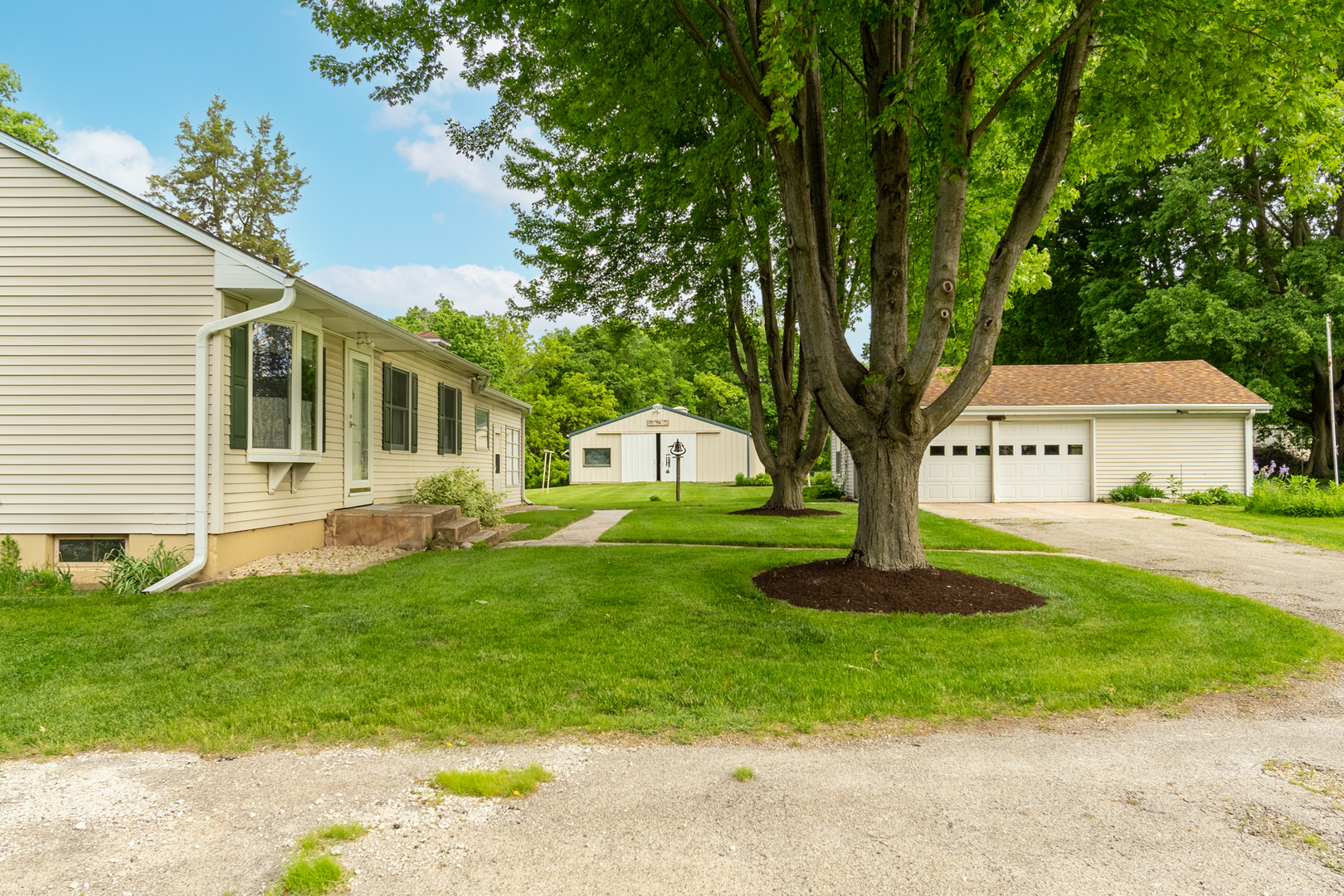 698 North 2853rd Road LaSalle, IL 61301 - Photo 10 of 39 a front view of a house with a yard and garage