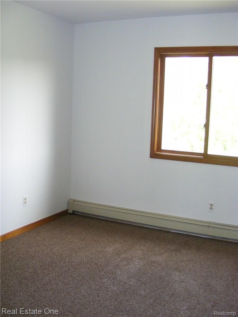 3930 West Maple Road Wixom, MI 48393 - Photo 10 of 23 Bedrooms 2 & 4