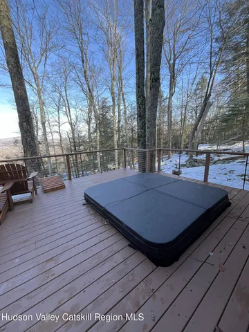 a view of a balcony with chairs