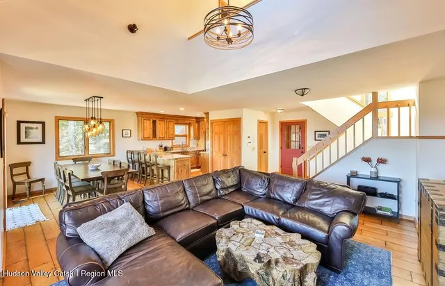 a living room with furniture and a table