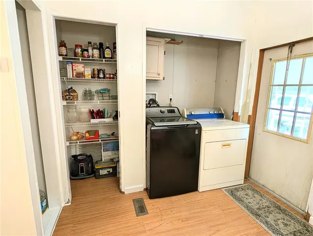 a bed room with a bed furniture and a window