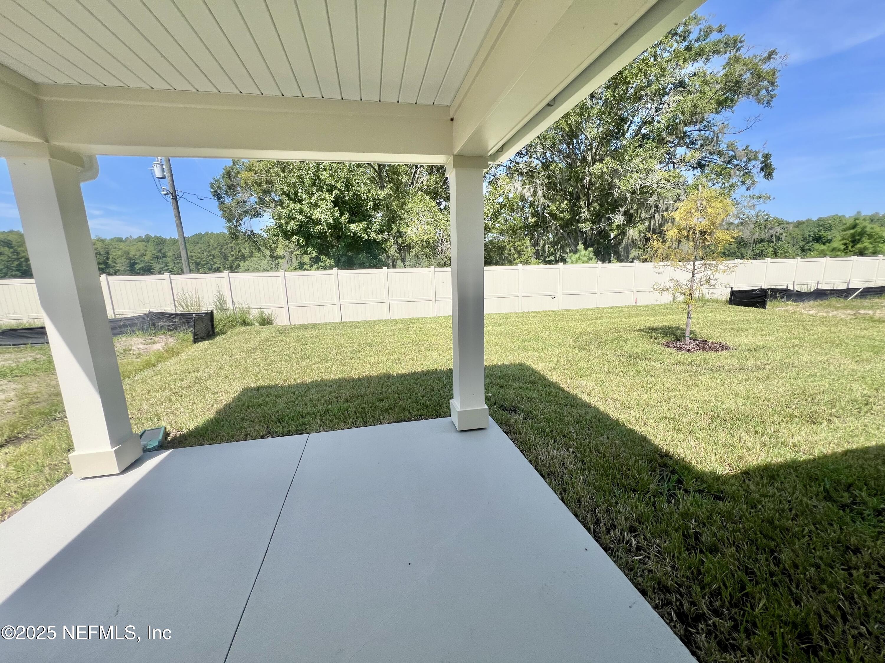 7714 Rippa Vly Way Jacksonville, FL 32222 - Photo 6 of 14 a view of a swimming pool with an outdoor seating