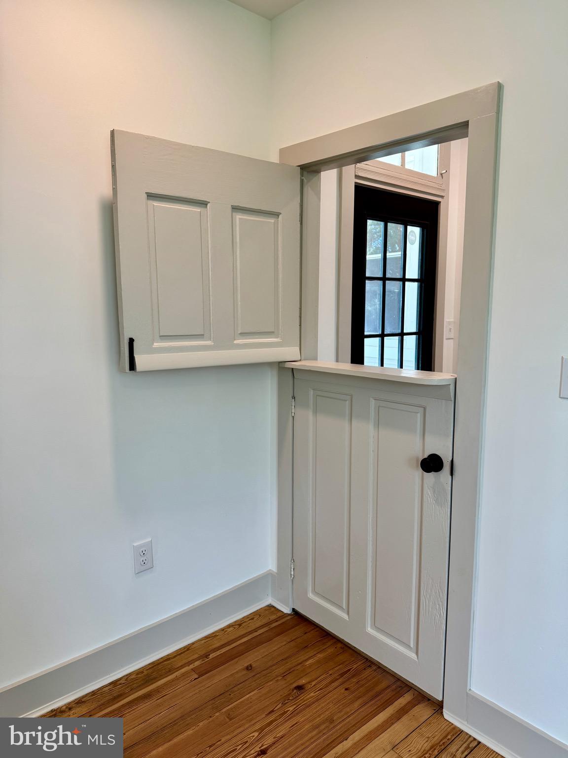3860 Main Street Trappe, MD 21673 - Photo 28 of 58 a view of an empty room with wooden floor and closet