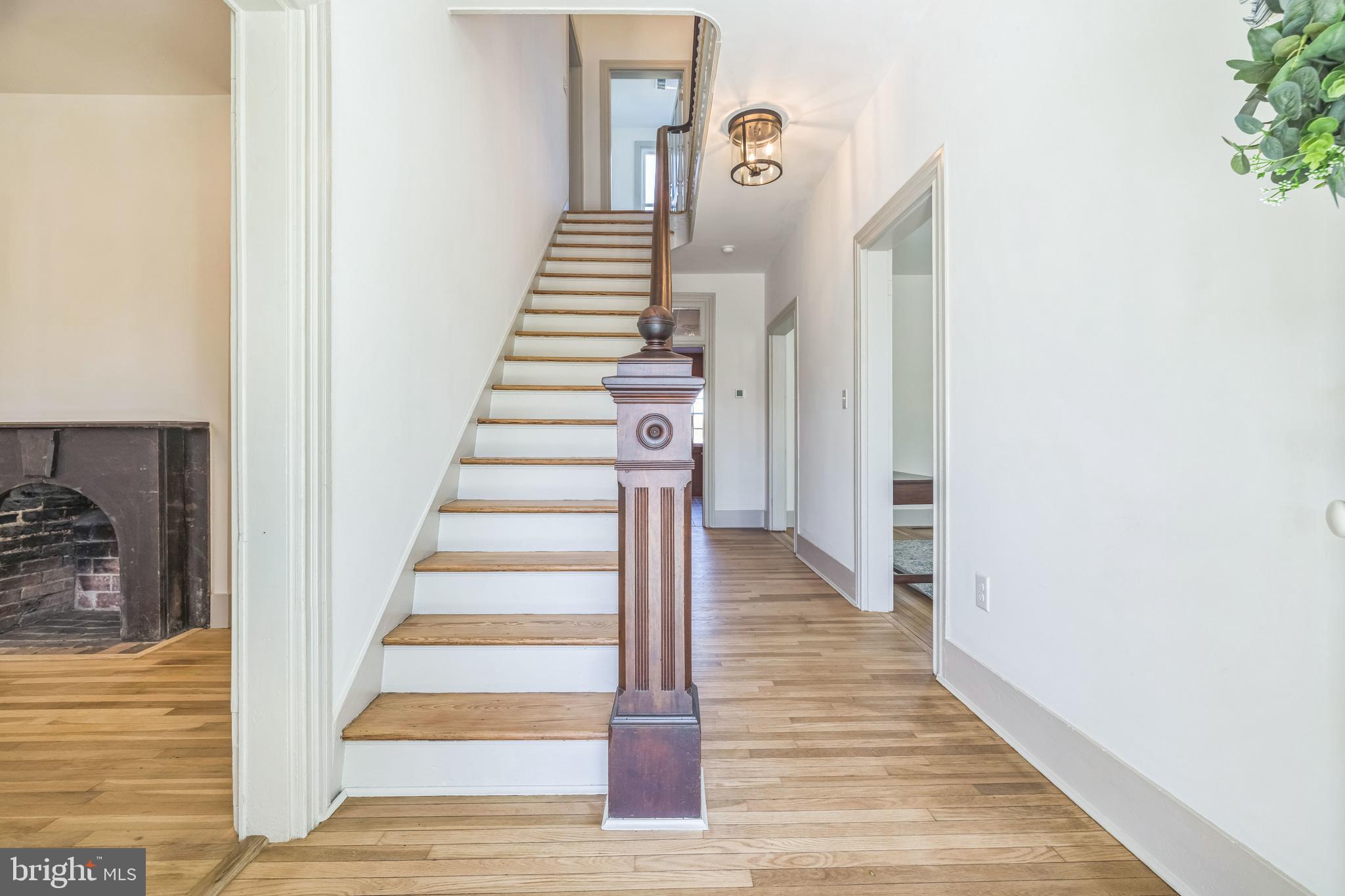 3860 Main Street Trappe, MD 21673 - Photo 3 of 58 a view of entryway and hall with wooden floor