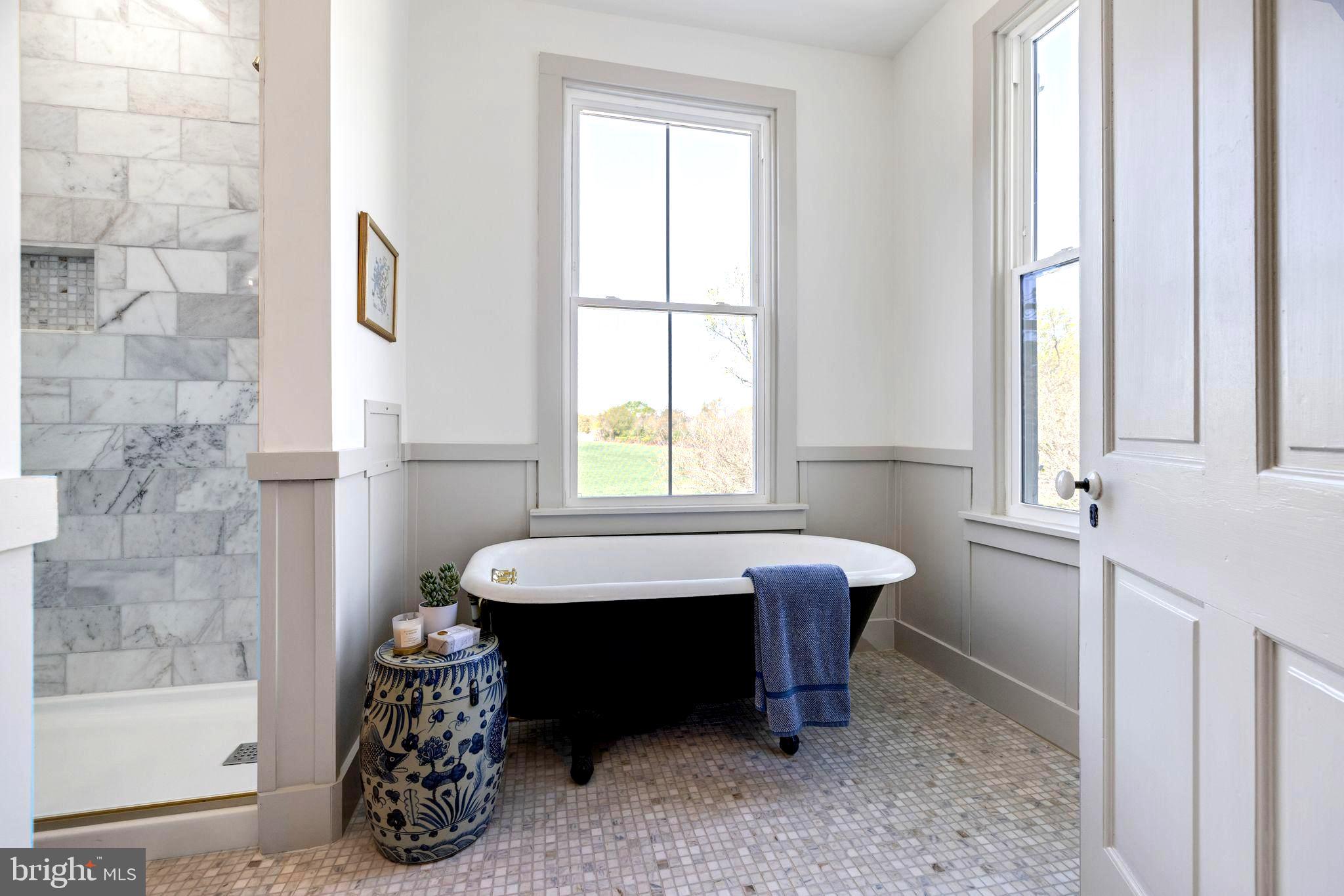 3860 Main Street Trappe, MD 21673 - Photo 36 of 58 a bedroom with a bed and a window