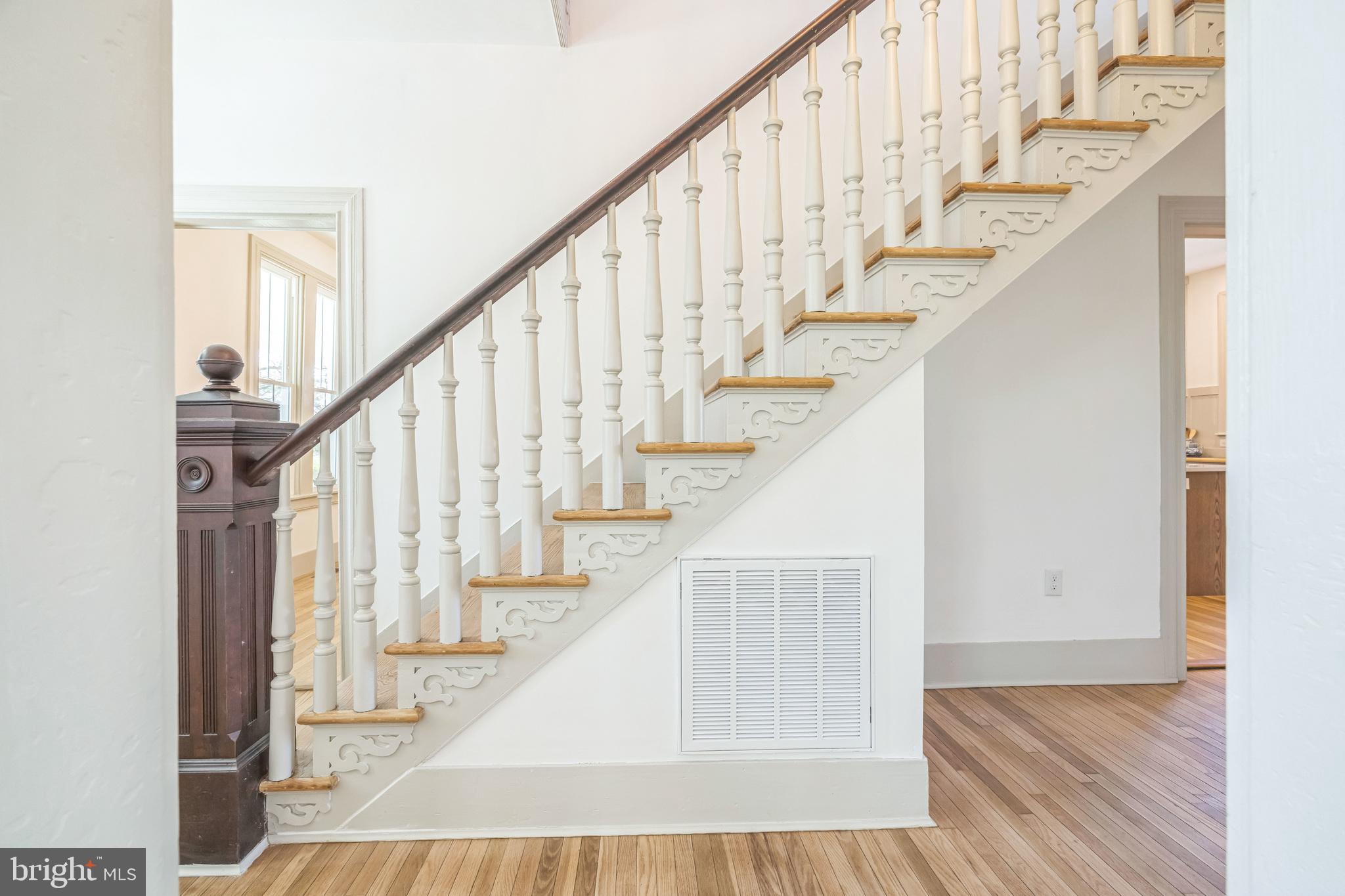 3860 Main Street Trappe, MD 21673 - Photo 4 of 58 a view of entryway with wooden floor