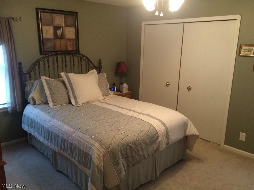 Master bedroom has california closets and lots of light.