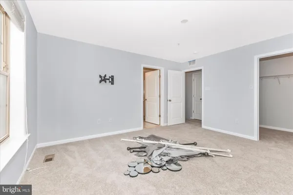 a view of a livingroom with furniture
