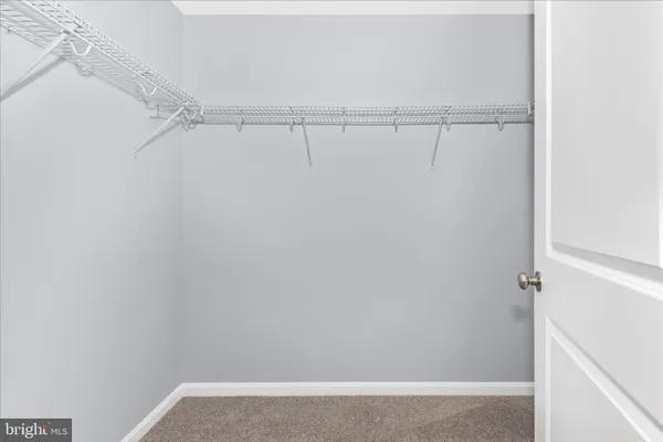 a view of small space with racks on the wall