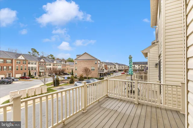 a view of a city with cars parked