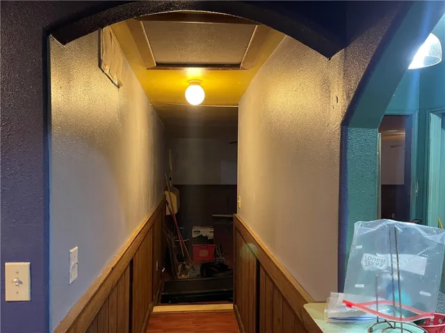 a room with furniture and a chandelier