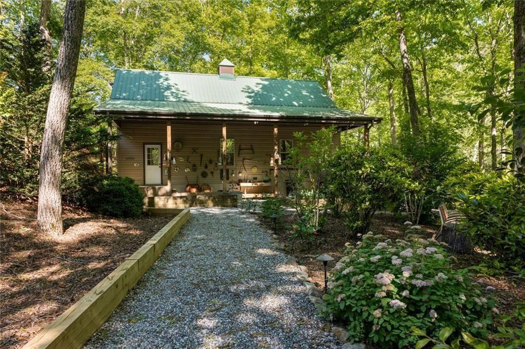 704 Riverbend Road Blairsville, GA 30512 - Photo 18 of 89 a view of backyard of house with green space