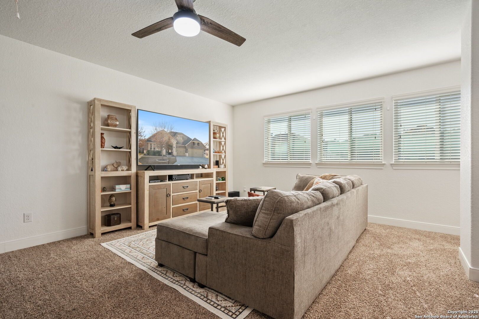 28827 Pfeiffers Gate Fair Oaks Ranch, TX 78015 - Photo 21 of 36 a living room with furniture and a window