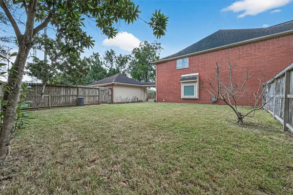 a brick house with a yard