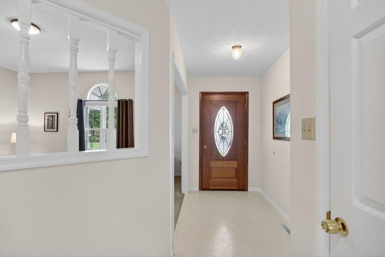 2220 Pine Woods Road Quicksburg, VA 22847 - Photo 33 of 75 Features; vinyl flooring and coat closet