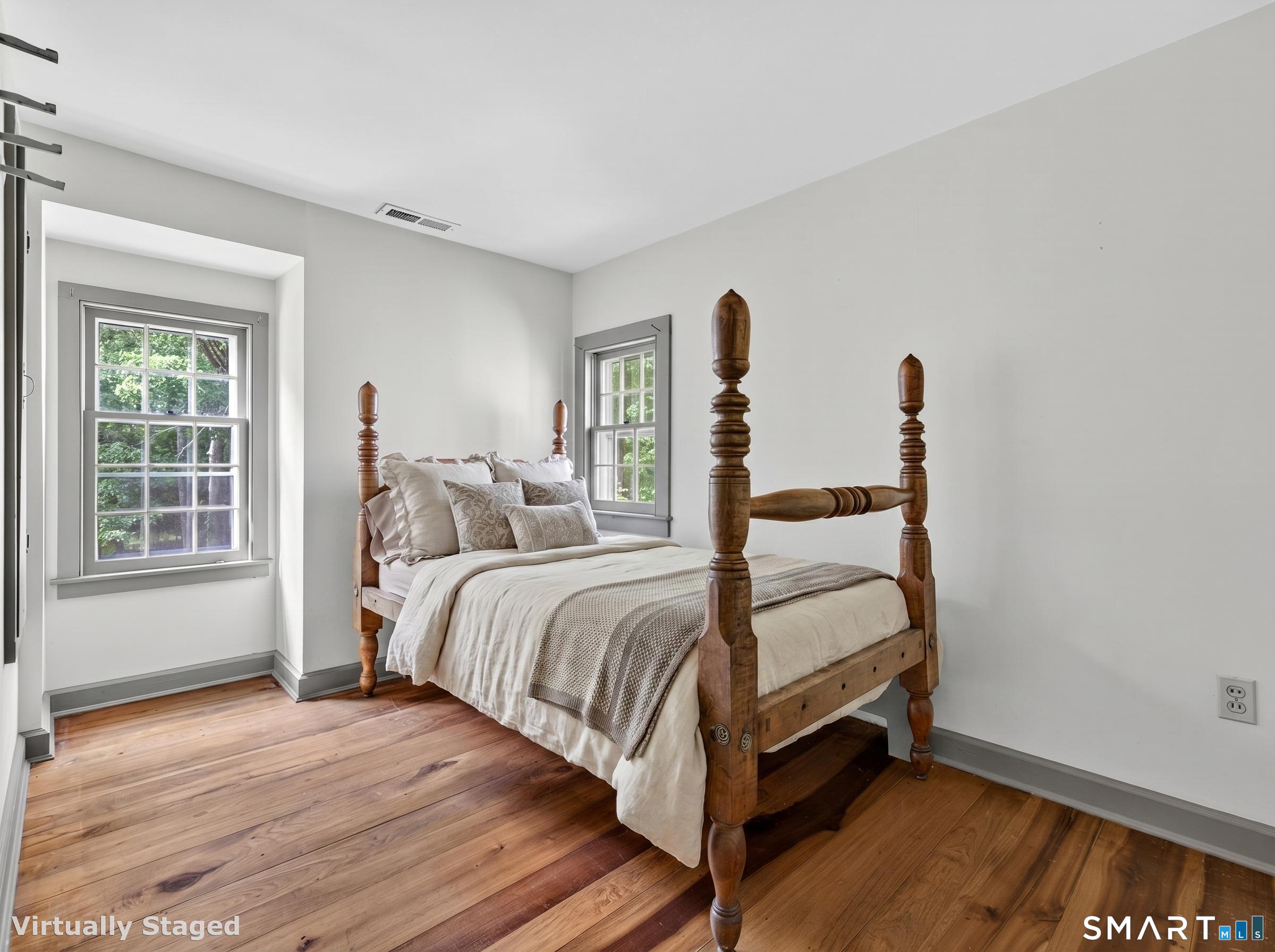 14 Cow Pen Hill Road Killingworth, CT 06419 - Photo 28 of 40 Head upstairs to discover the first of three spacious secondary bedrooms, each offering comfort, character, and flexibility for family or guests