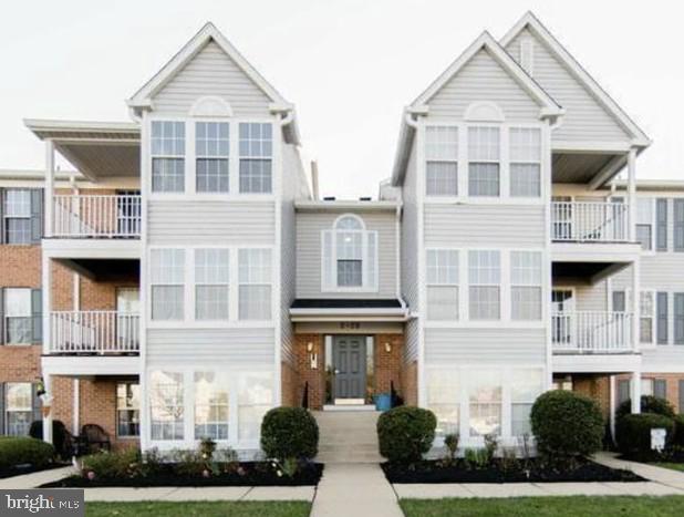 Charming duplex with inviting facade.