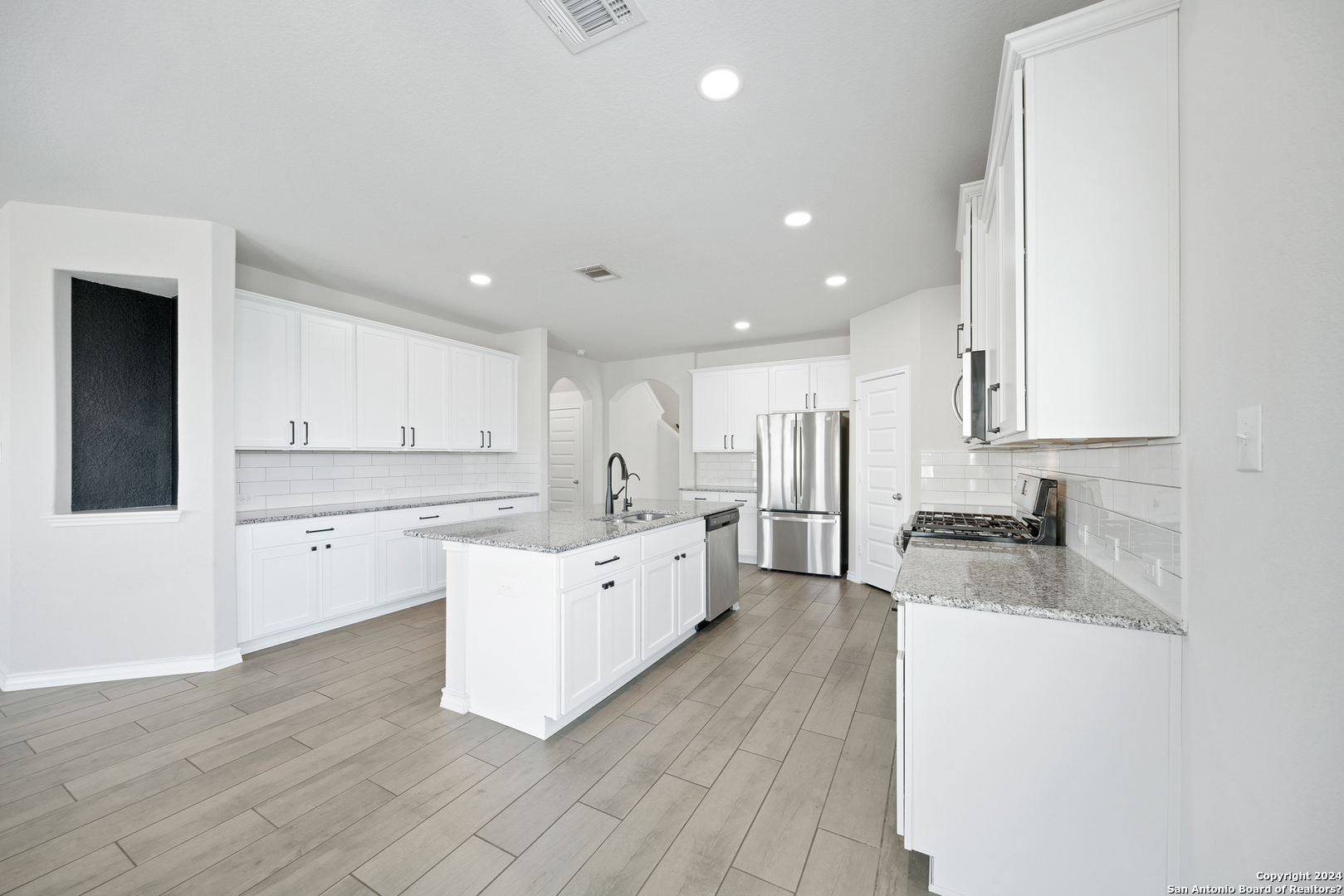 648 Amber Creek Cibolo, TX 78108 - Photo 14 of 34 a large kitchen with a lot of counter space and a sink
