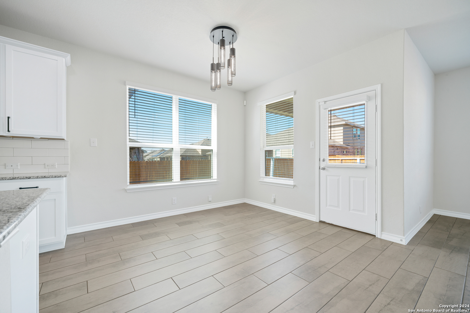 648 Amber Creek Cibolo, TX 78108 - Photo 16 of 34 an empty room with windows