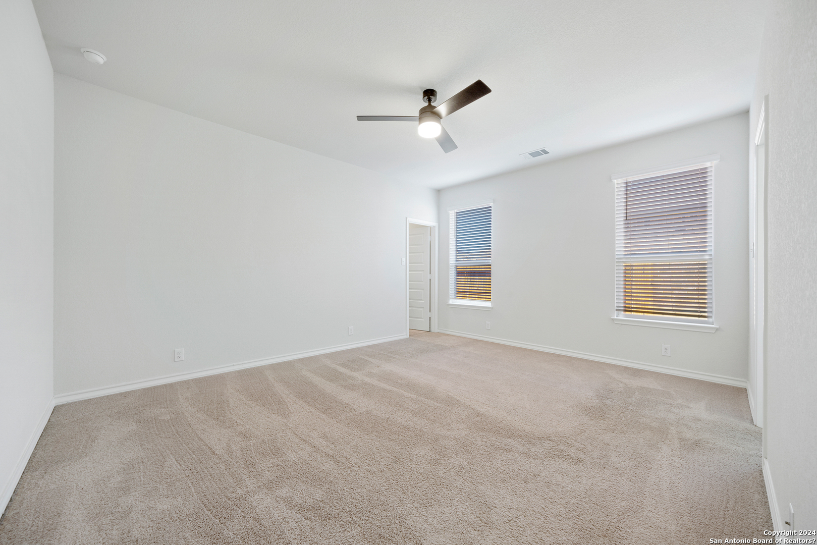 648 Amber Creek Cibolo, TX 78108 - Photo 19 of 34 a view of an empty room with a window