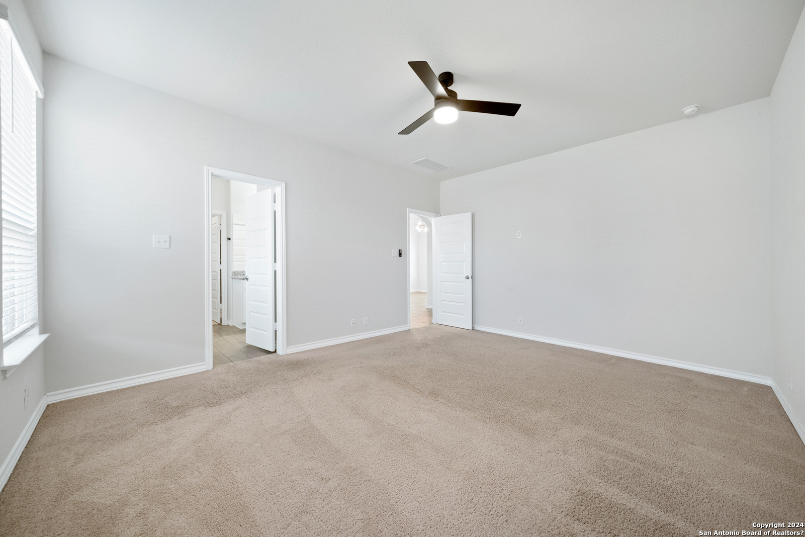 648 Amber Creek Cibolo, TX 78108 - Photo 20 of 34 an empty room with a empty space and windows