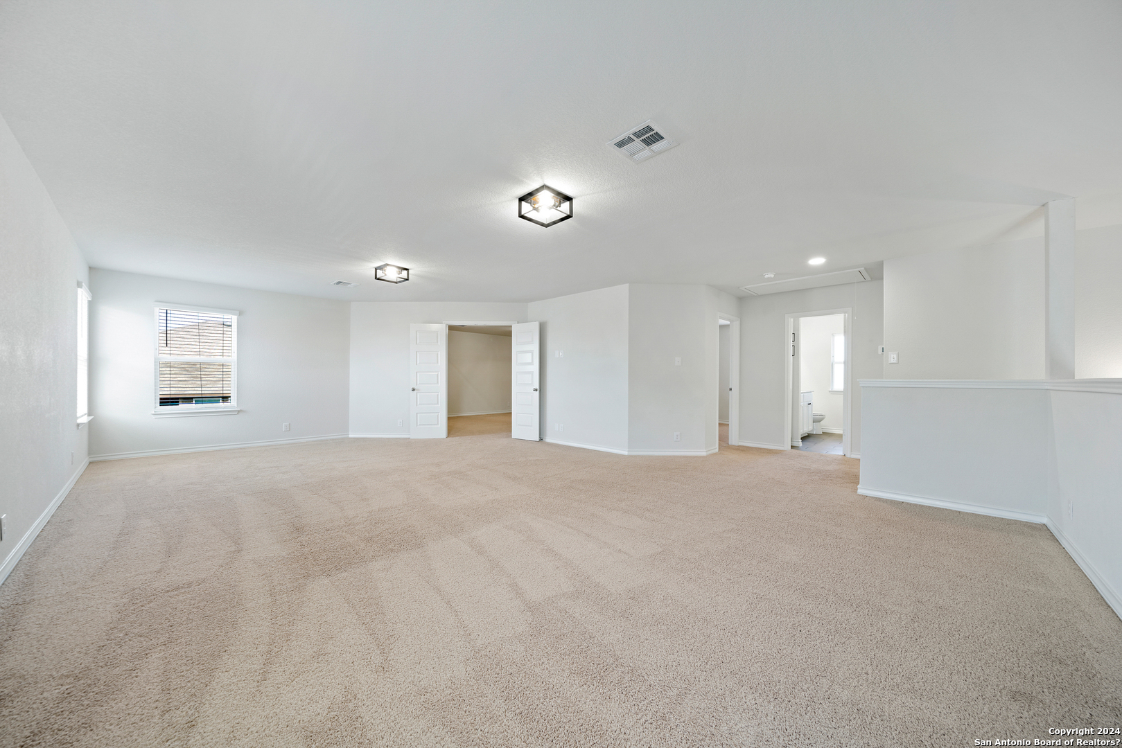 648 Amber Creek Cibolo, TX 78108 - Photo 26 of 34 a view of an empty room with a window