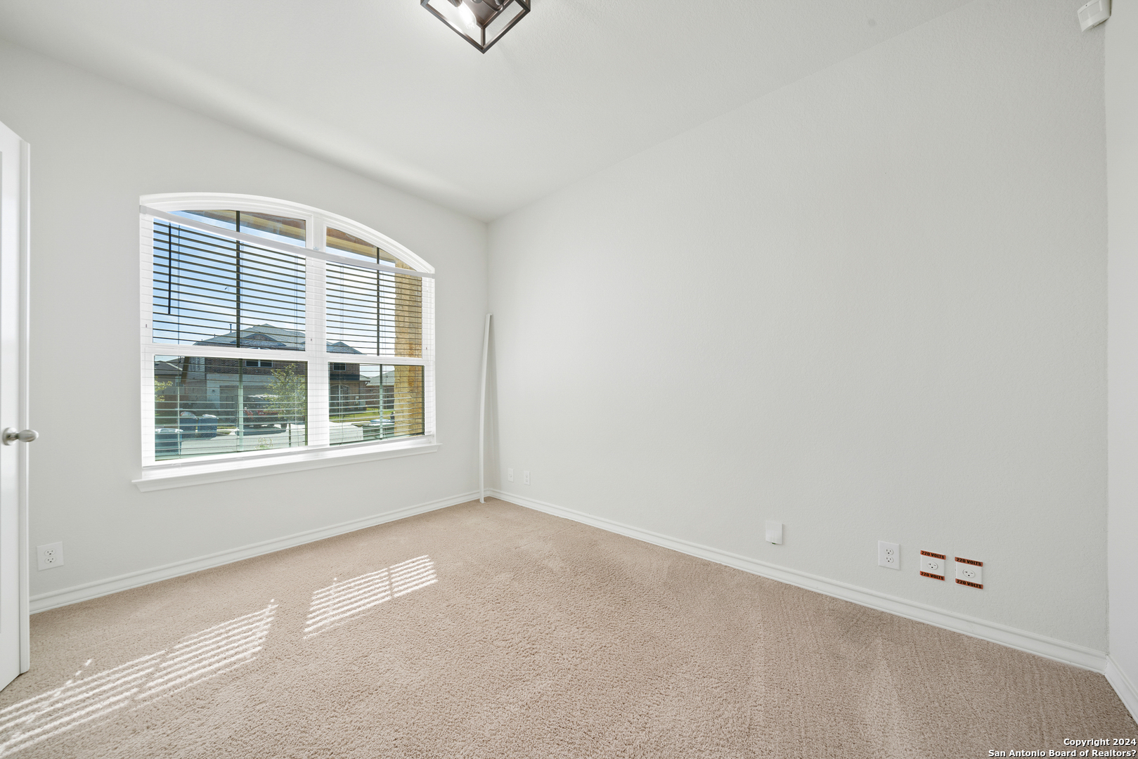 648 Amber Creek Cibolo, TX 78108 - Photo 6 of 34 an empty room with a window