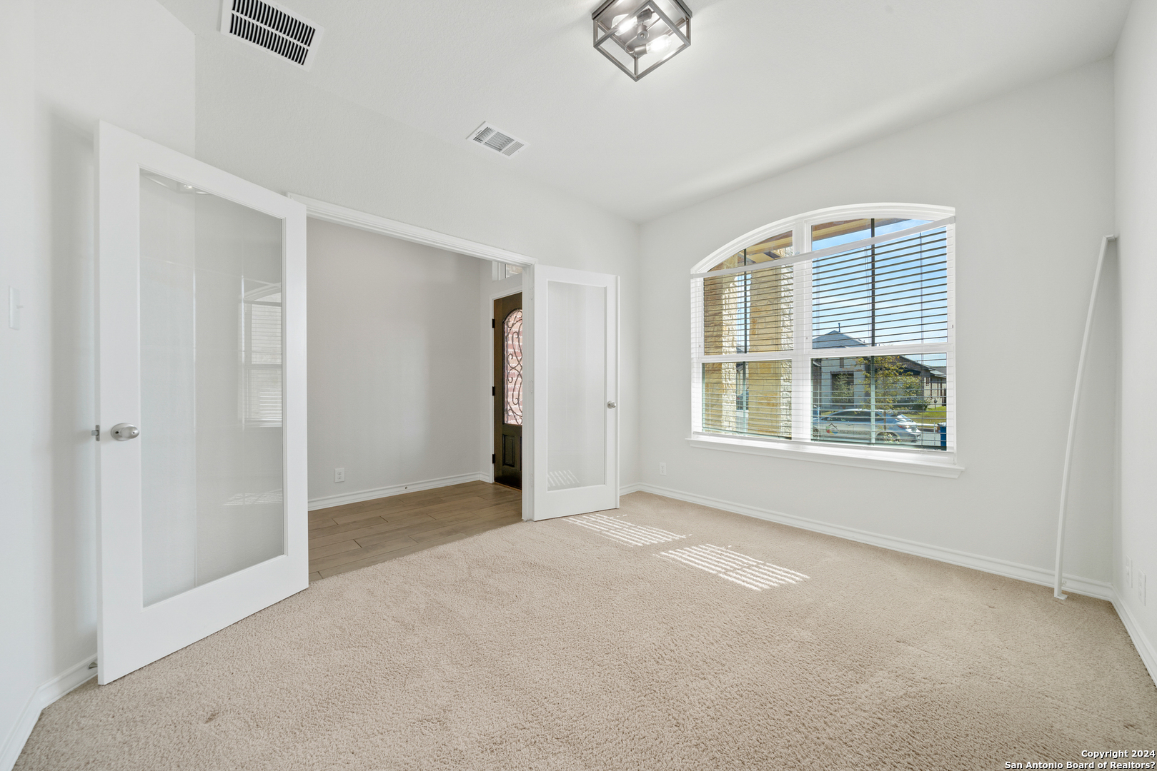 648 Amber Creek Cibolo, TX 78108 - Photo 7 of 34 a view of an empty room with a window