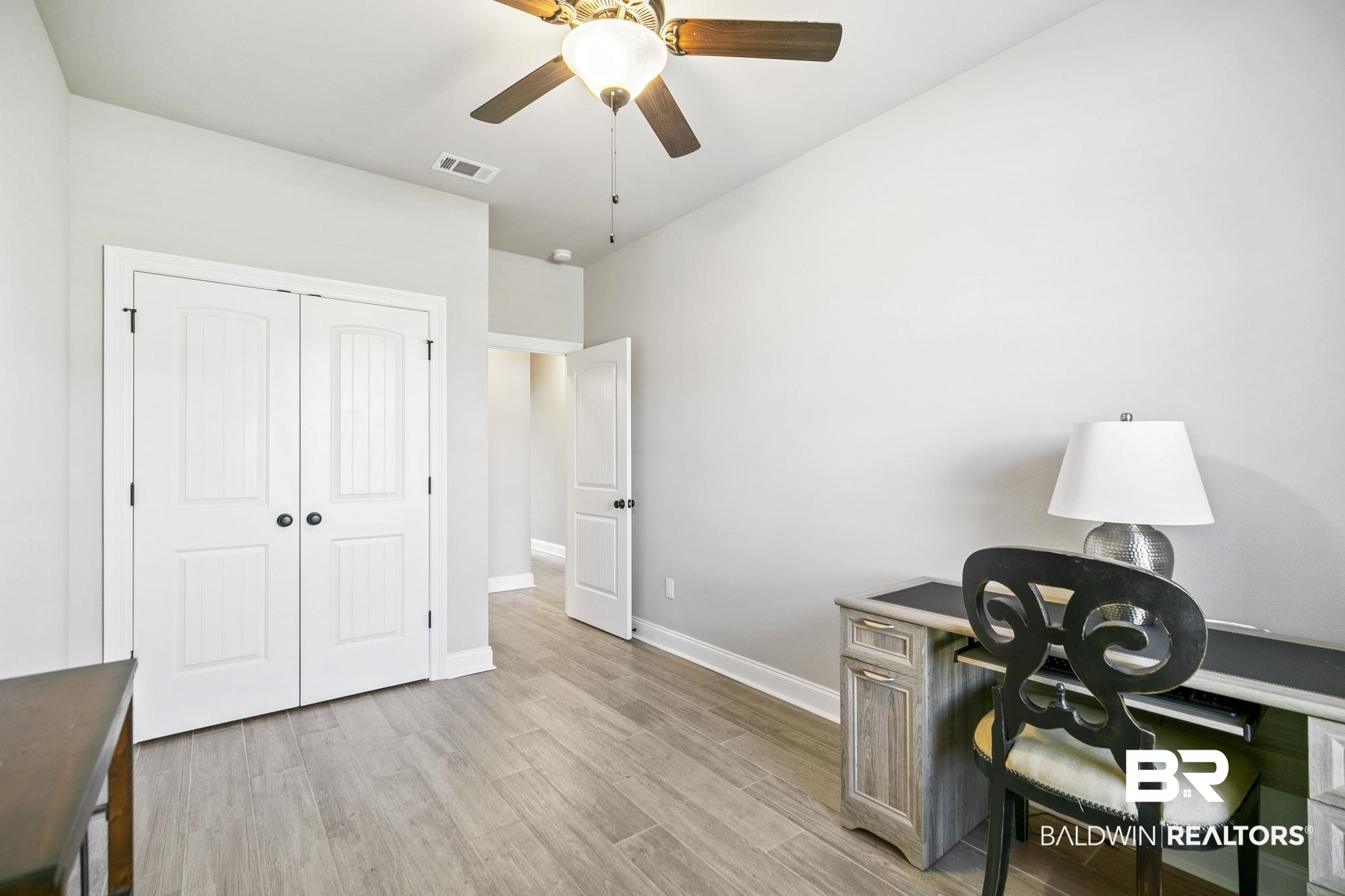 10140 Chipper Lane Foley, AL 36535 - Photo 39 of 72 Office space with ceiling fan and light hardwood / wood-style flooring