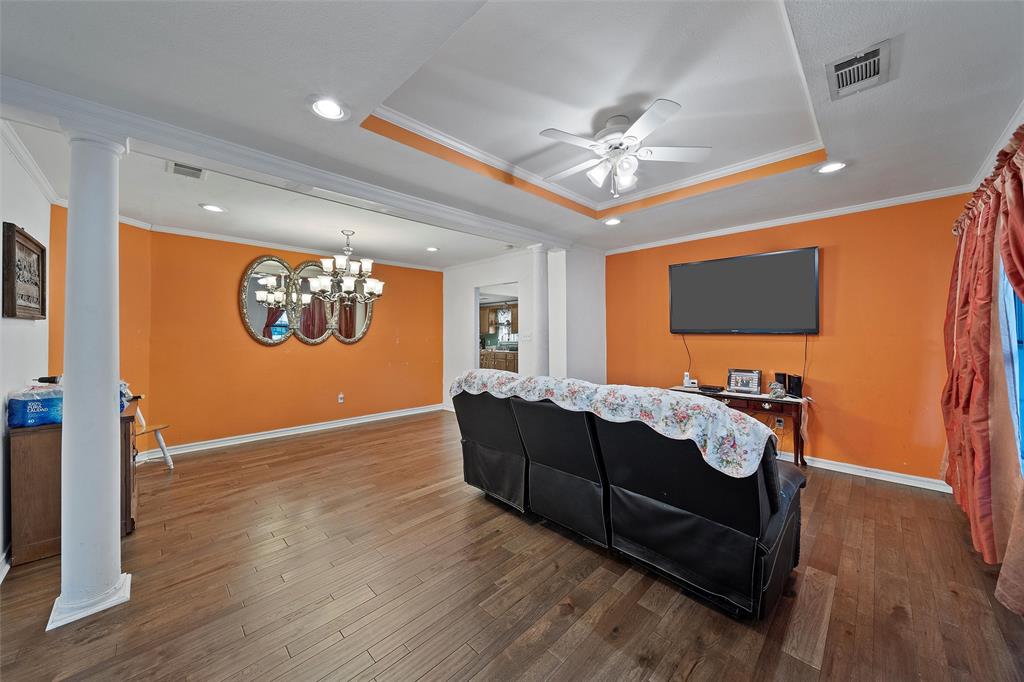 1917 Bell Street Waco, TX 76711 - Photo 4 of 17 a living room with furniture and a flat screen tv