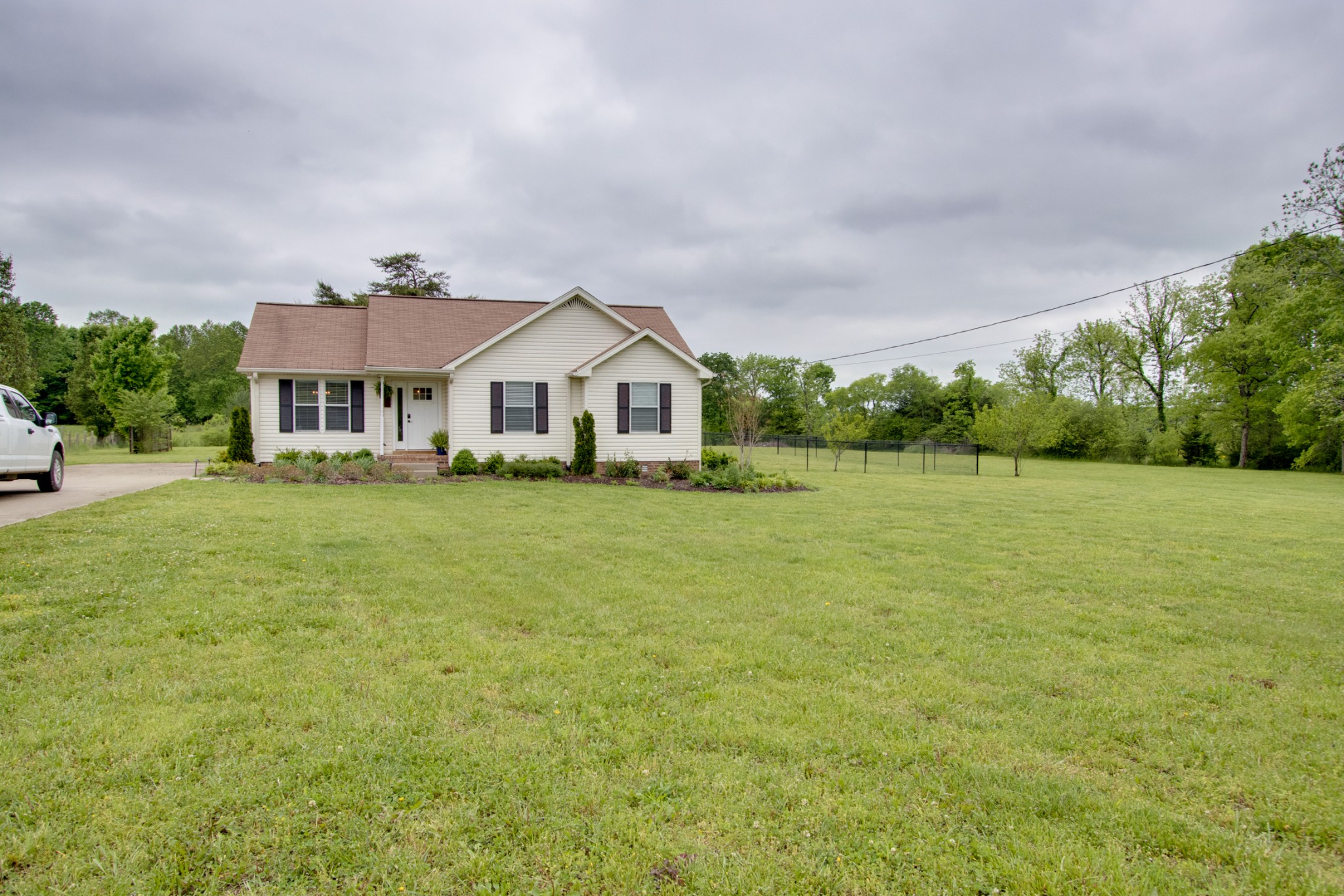 576 Bellwood Road Lebanon, TN 37087 - Photo 14 of 34 a front view of a house with a garden