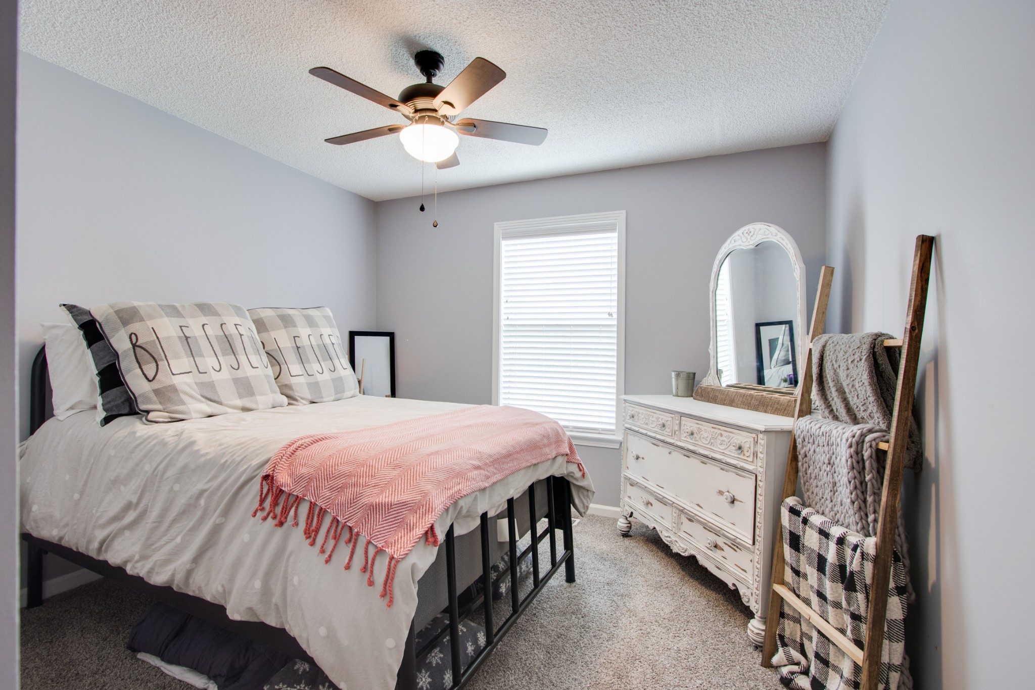 576 Bellwood Road Lebanon, TN 37087 - Photo 28 of 34 a bedroom with a bed a dresser and window