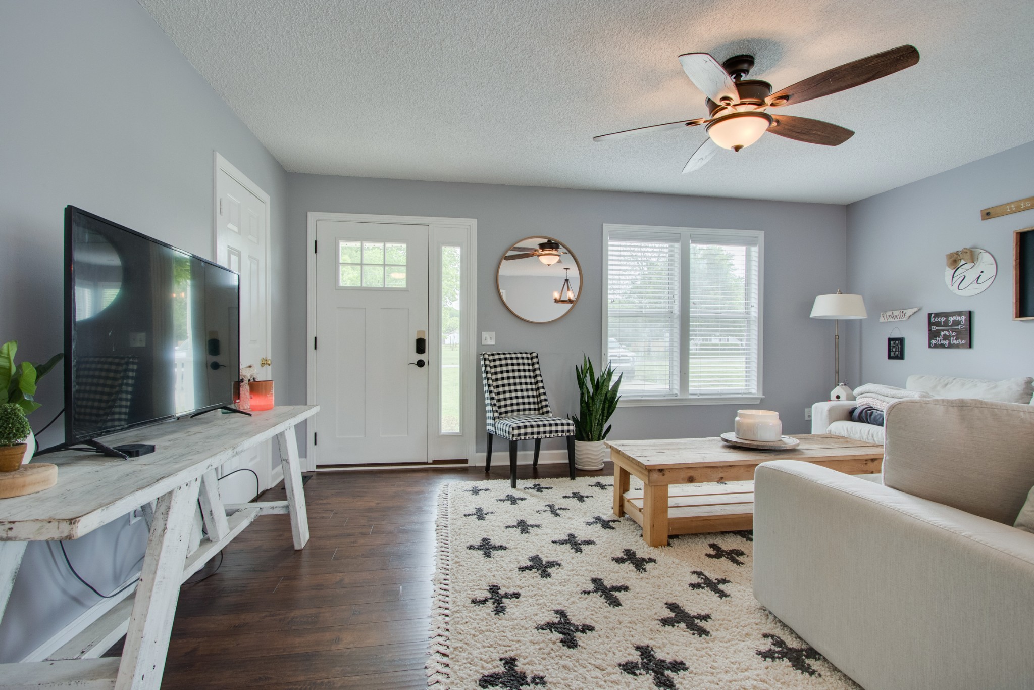 576 Bellwood Road Lebanon, TN 37087 - Photo 8 of 34 a living room with furniture and a flat screen tv