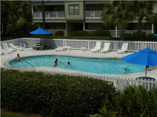 3799 Hwy Santa Rosa Beach, Unit 10B 30A Santa Rosa Beach, FL 32459 - Photo 1 of 16 a view of swimming pool with a bench in patio