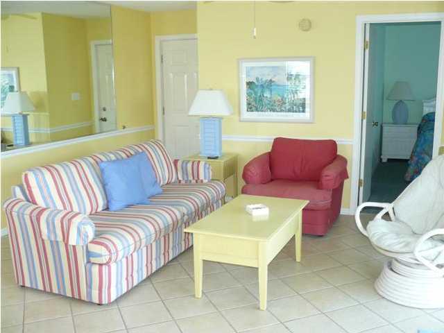 3799 Hwy Santa Rosa Beach, Unit 10B 30A Santa Rosa Beach, FL 32459 - Photo 12 of 16 a living room with furniture and a couch