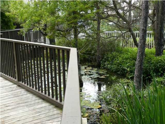 3799 Hwy Santa Rosa Beach, Unit 10B 30A Santa Rosa Beach, FL 32459 - Photo 7 of 16 a view of balcony with wooden floor