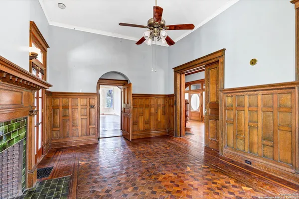 a view of living room with wooden floor and furniture