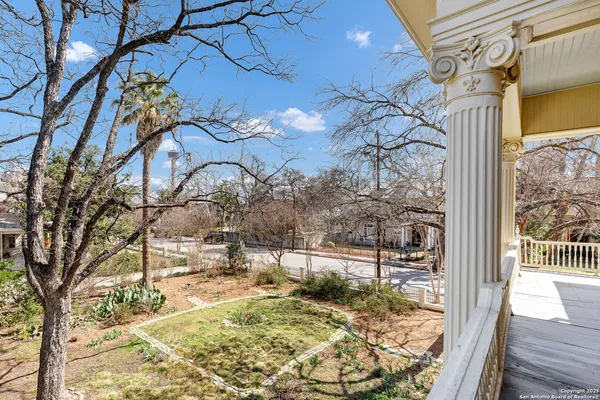 front view of a house with a garden