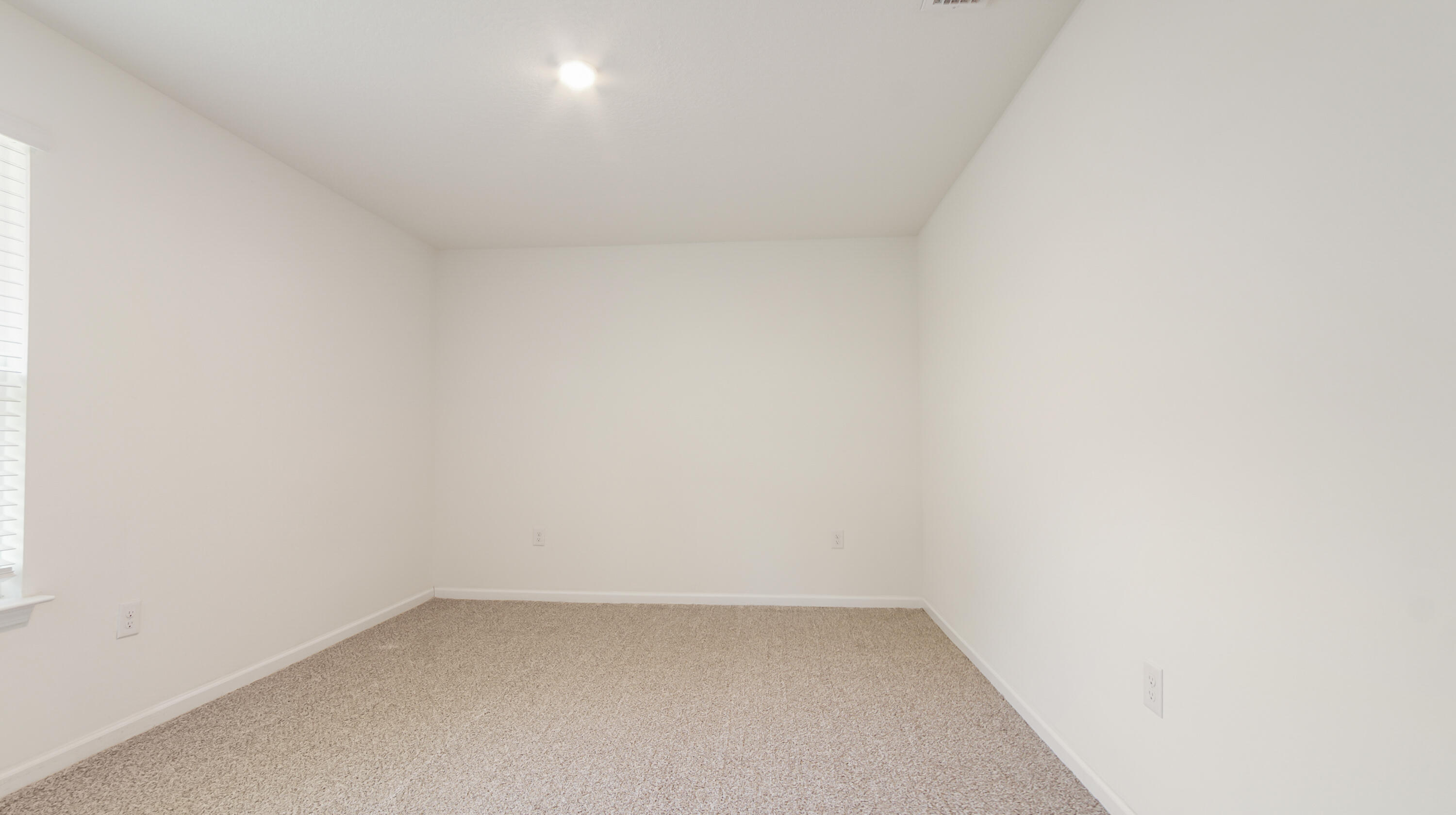720 Riverwalk Circle Freeport, FL 32439 - Photo 20 of 50 a view of an empty room