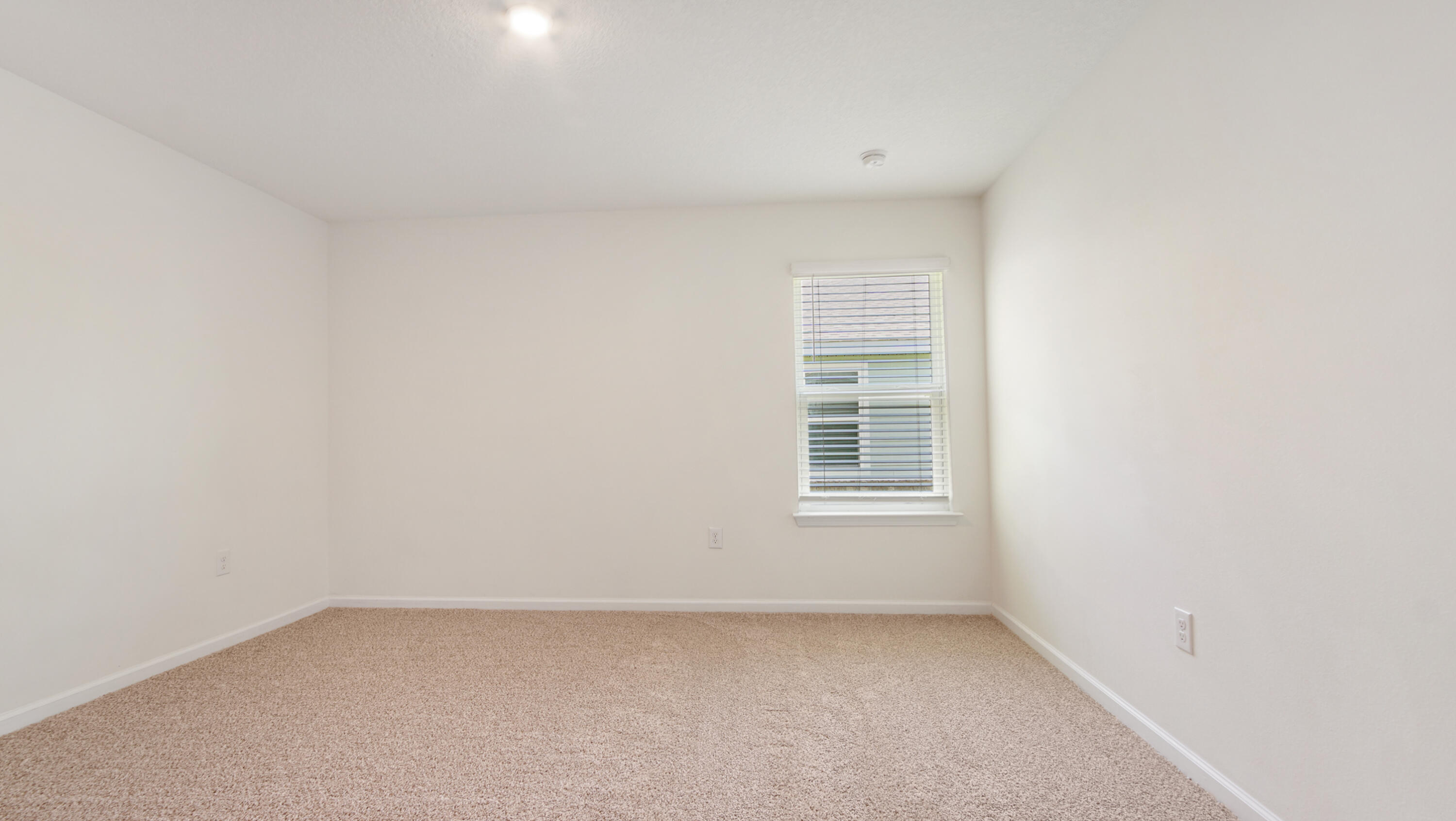 720 Riverwalk Circle Freeport, FL 32439 - Photo 22 of 50 a view of an empty room with a window